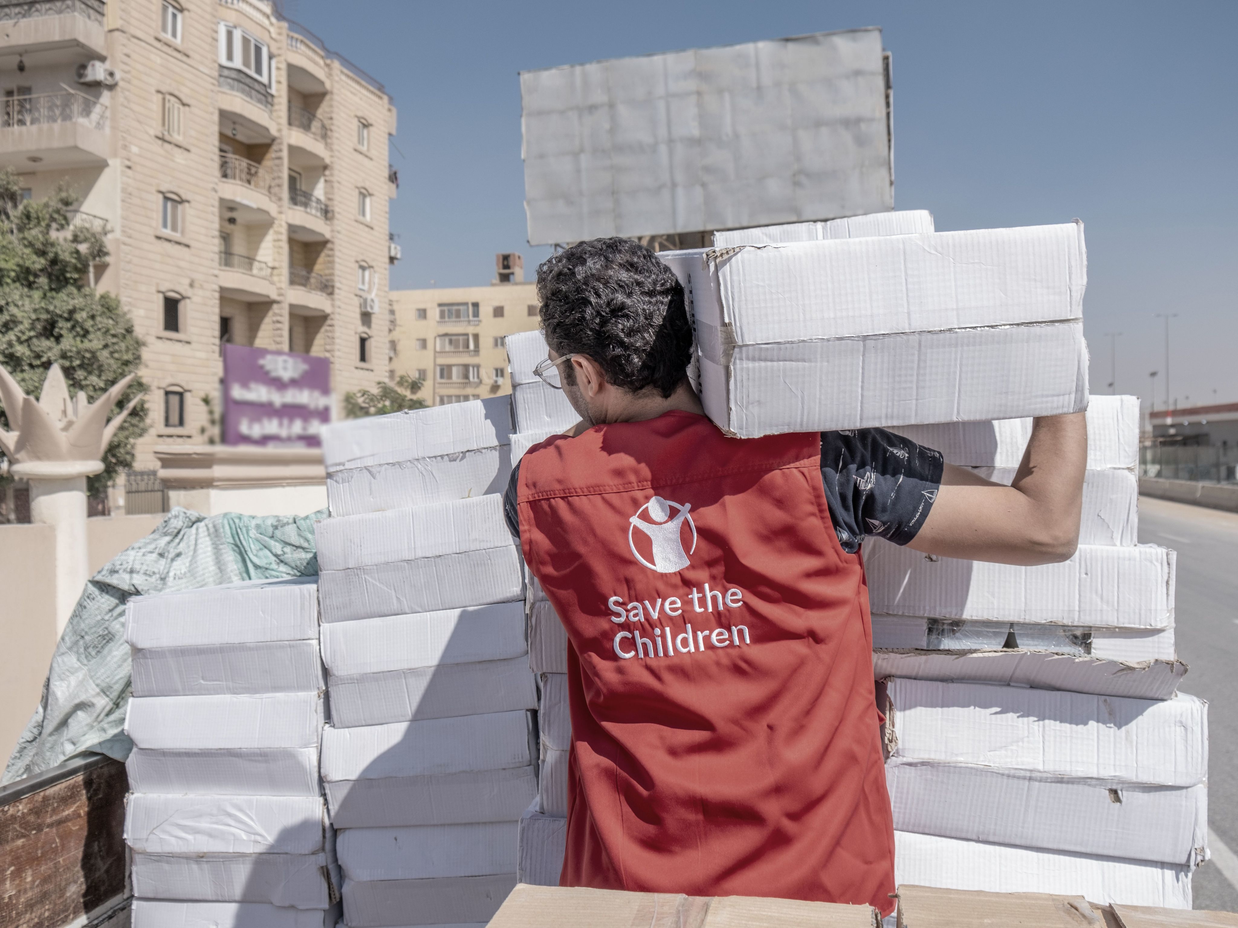 Save the Children staff packing medical supplies for transport into Gaza. Photo: Kareem Ayman/Save the Children
